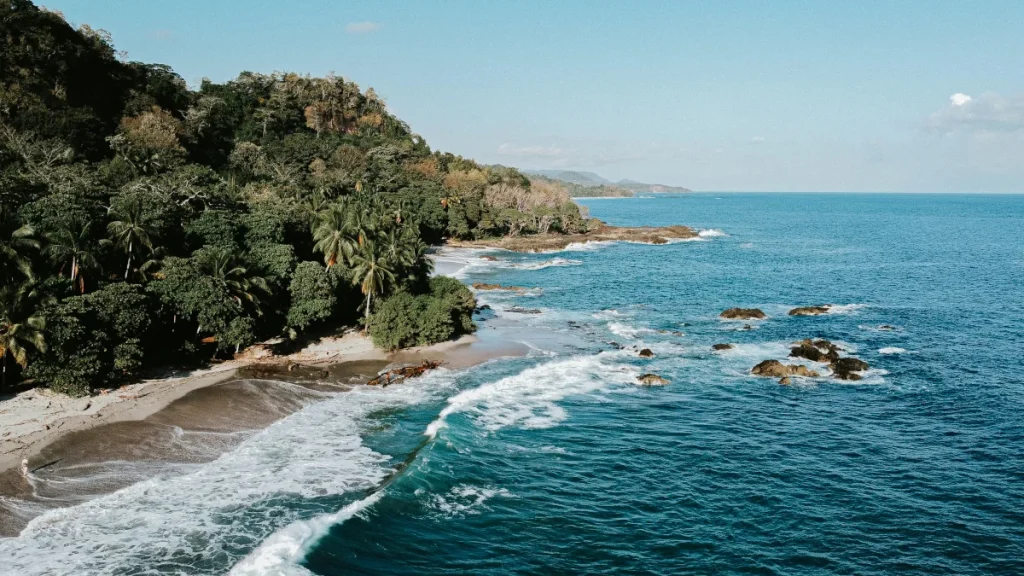 Waves breaking along the rocky tropical Pacific coastline near Playa Potrero, Guanacaste, Costa Rica