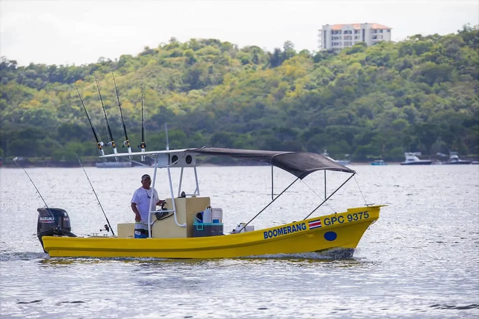 Boomerang 27-foot Panga fishing charter cruising off Playa Potrero, Costa Rica